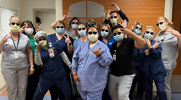 a group of nurses wearing sunglasses