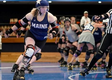 Physical Therapist Jess Sterling skates while playing roller derby.