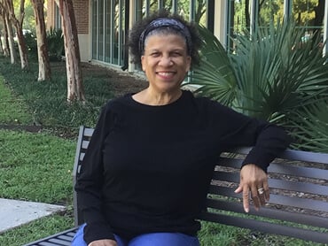 Karen Narvarre smiles after inpatient rehabilitation.